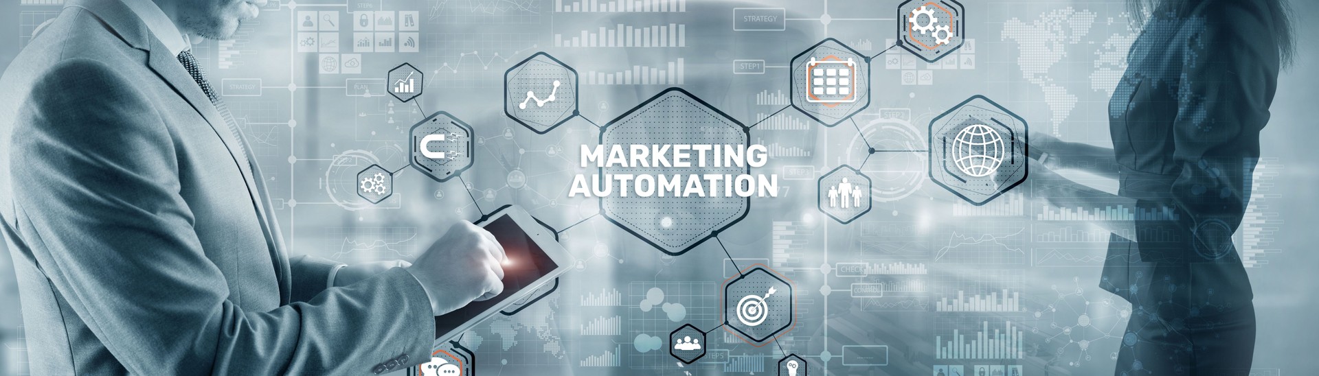 Marketing automation on the virtual screen. Man clicks on the inscription Marketing